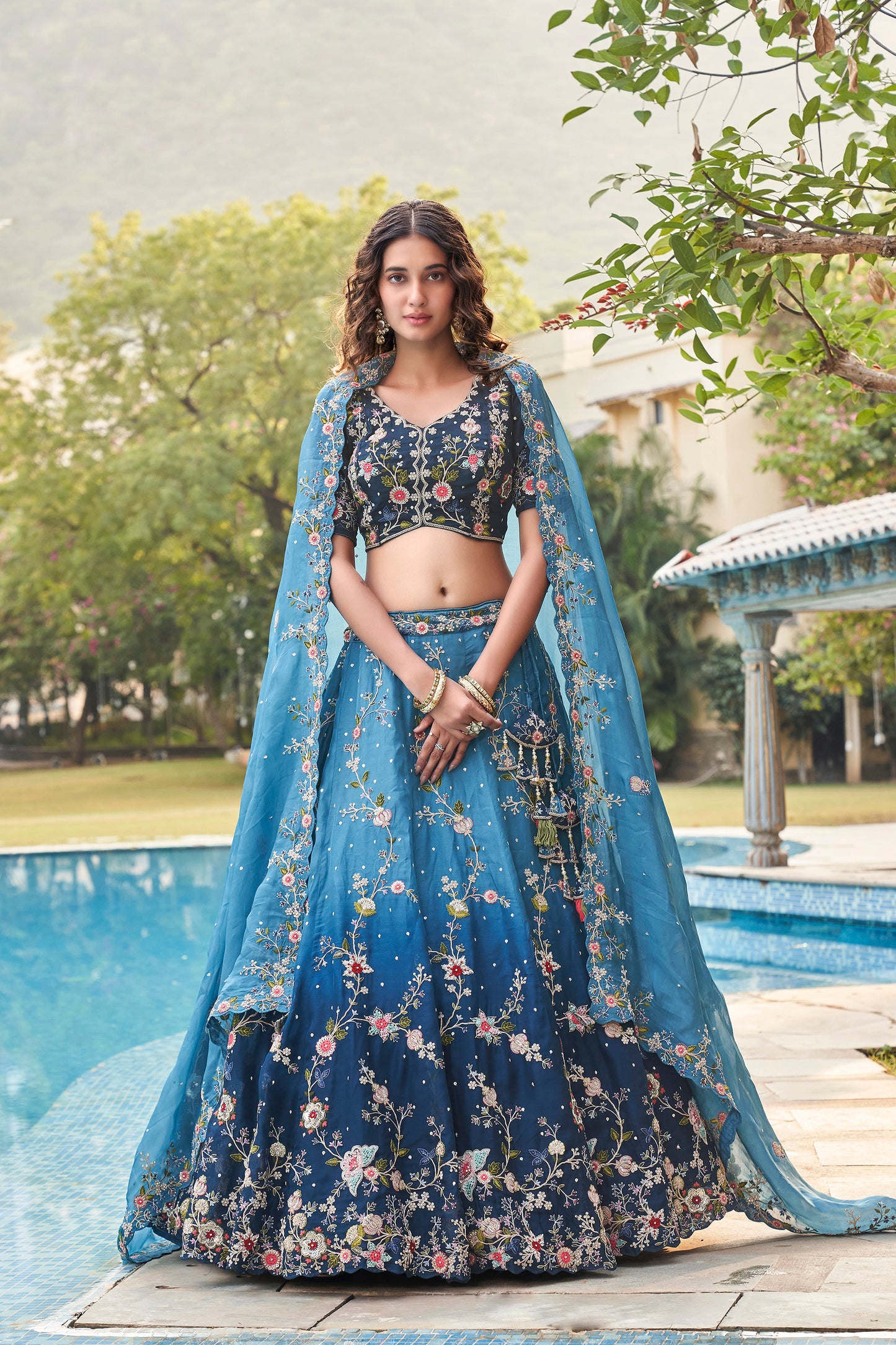 Blue bridal lehenga full view with organza flare