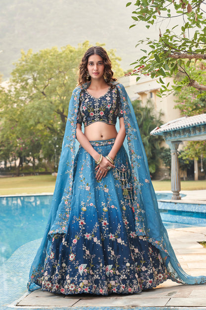 Organza lehenga choli with diamond and stone work detail