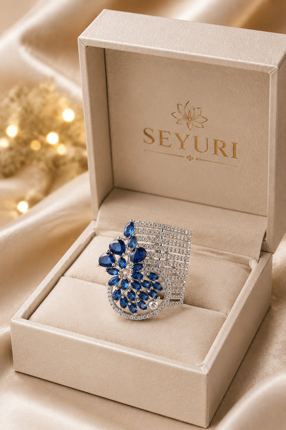 Designer blue stone ring displayed in luxury product photography