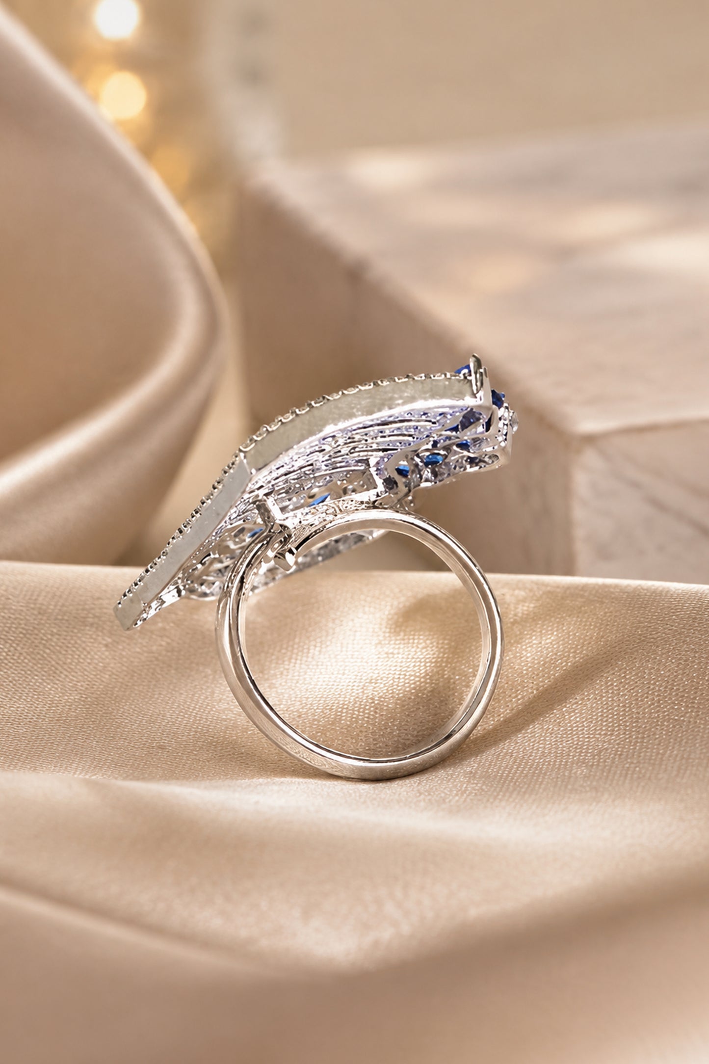Side angle view of floral statement ring design