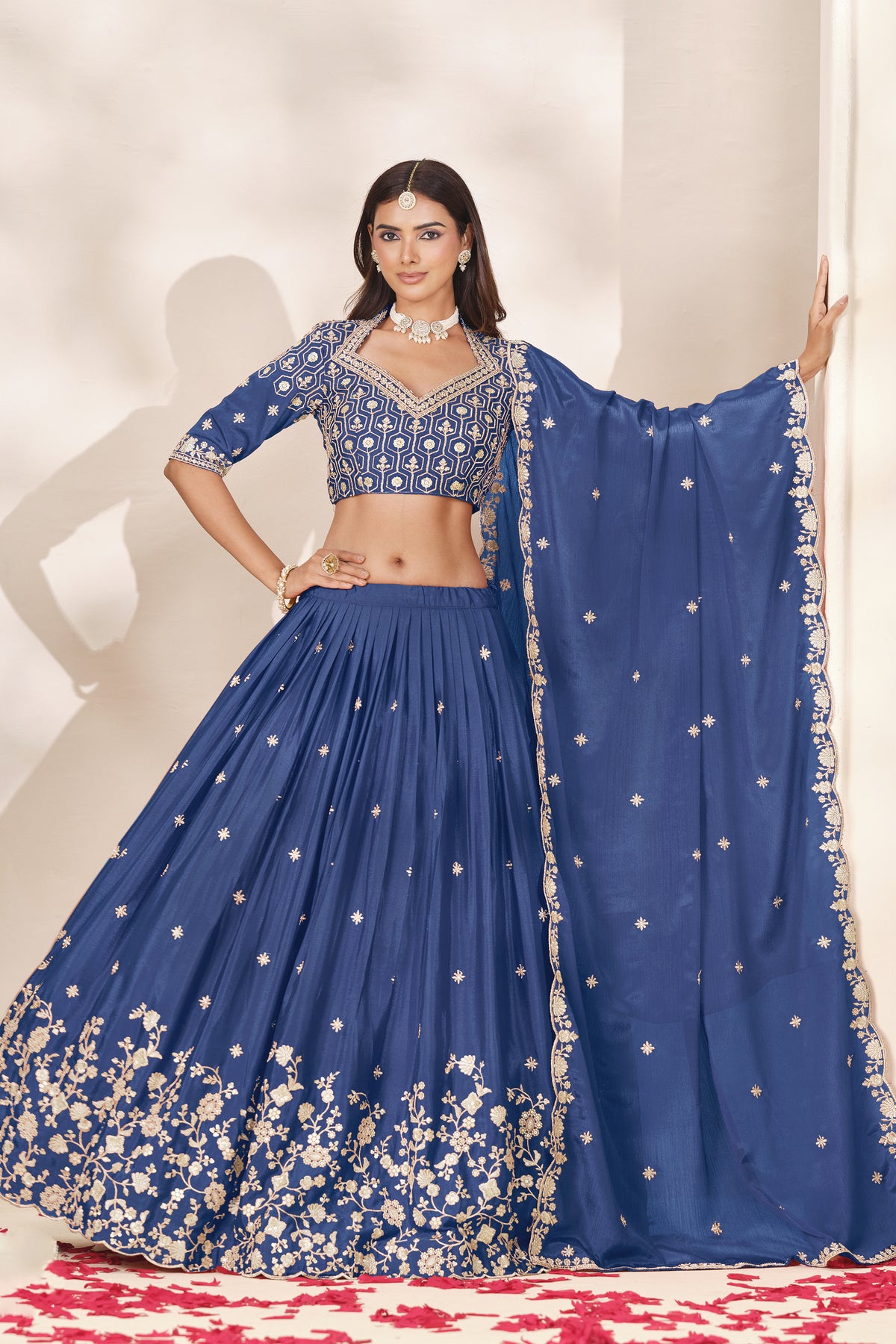 Blue blouse with embroidery work, front detail.