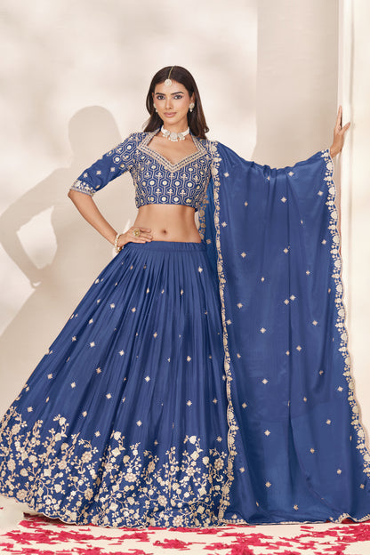 Blue blouse with embroidery work, front detail.