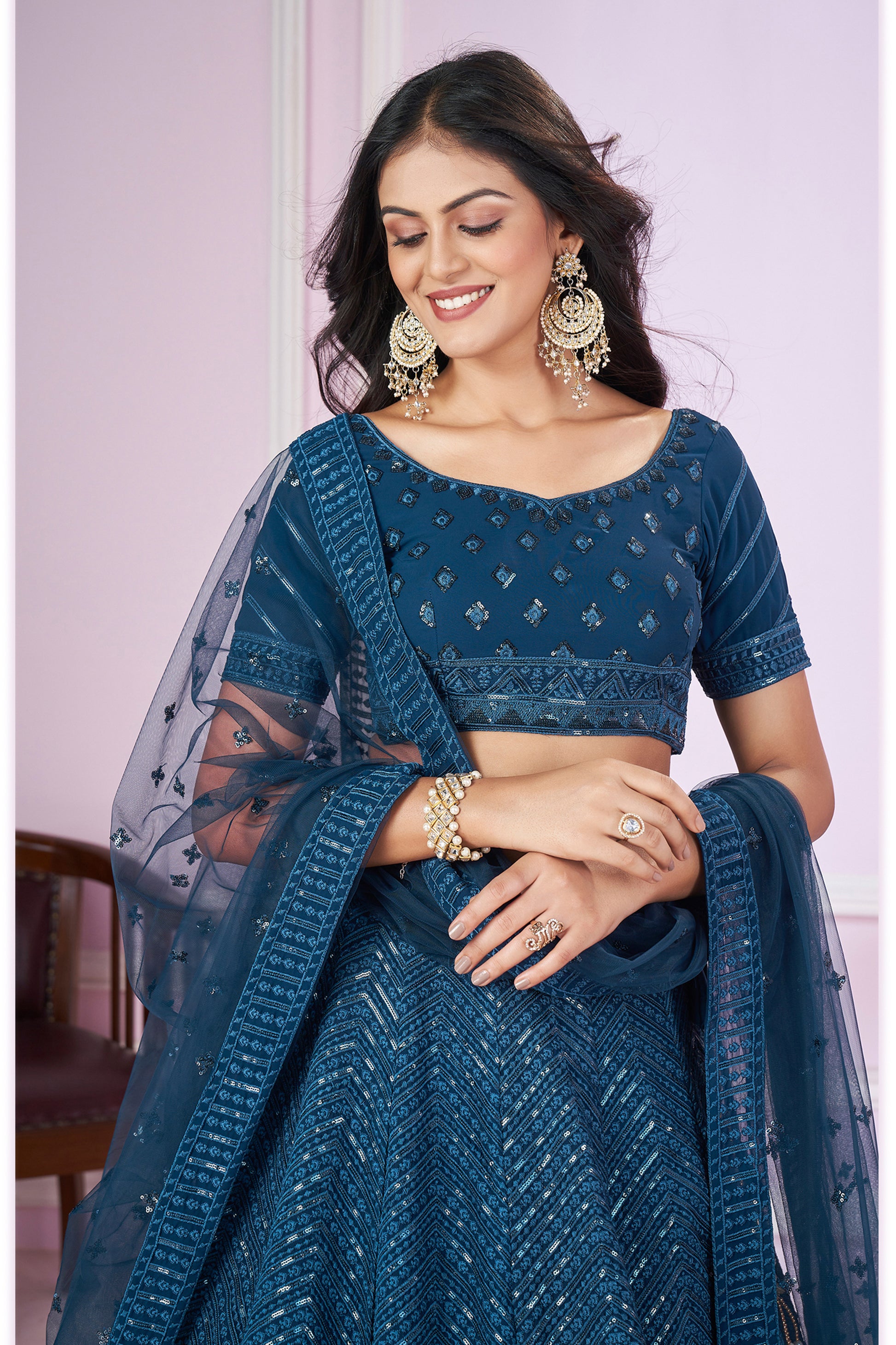 Blue lehenga close-up of embroidery craftsmanship