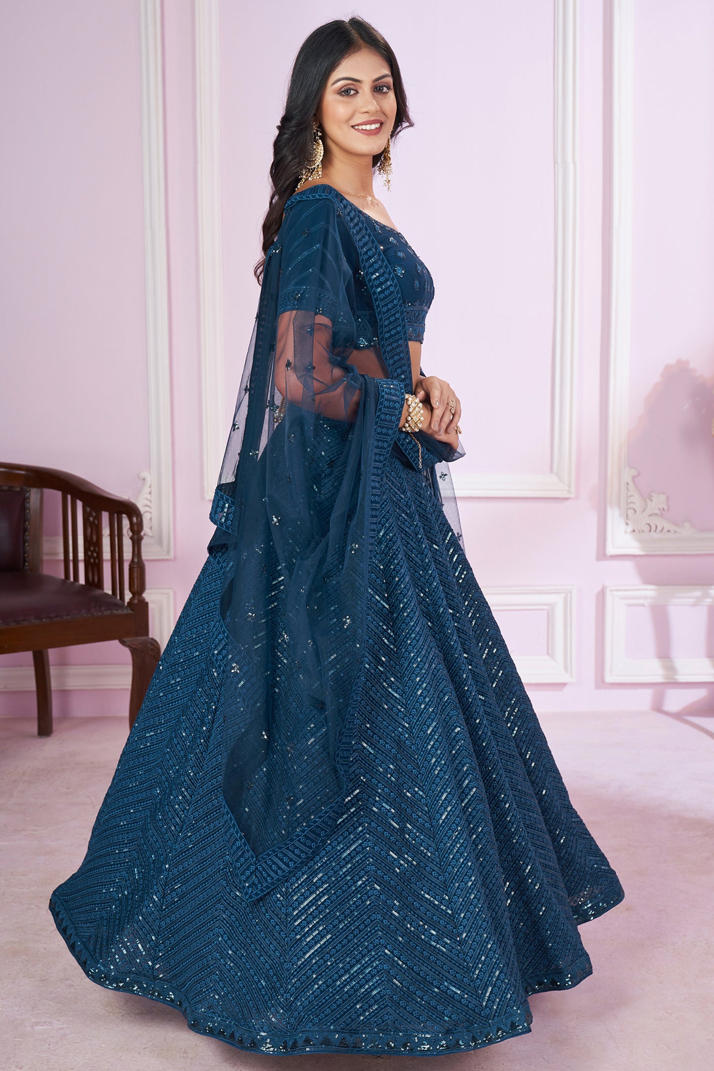 Blue lehenga choli styled for wedding occasion