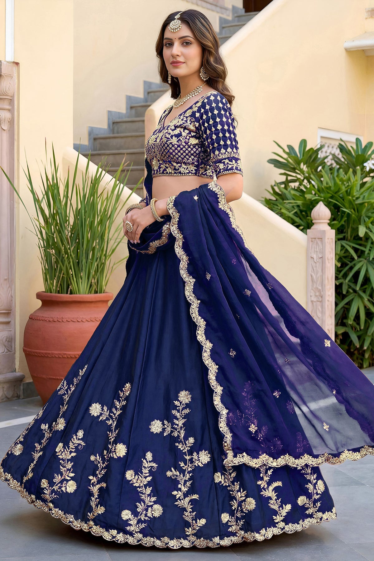 Blue lehengha choli side view with matching dupatta