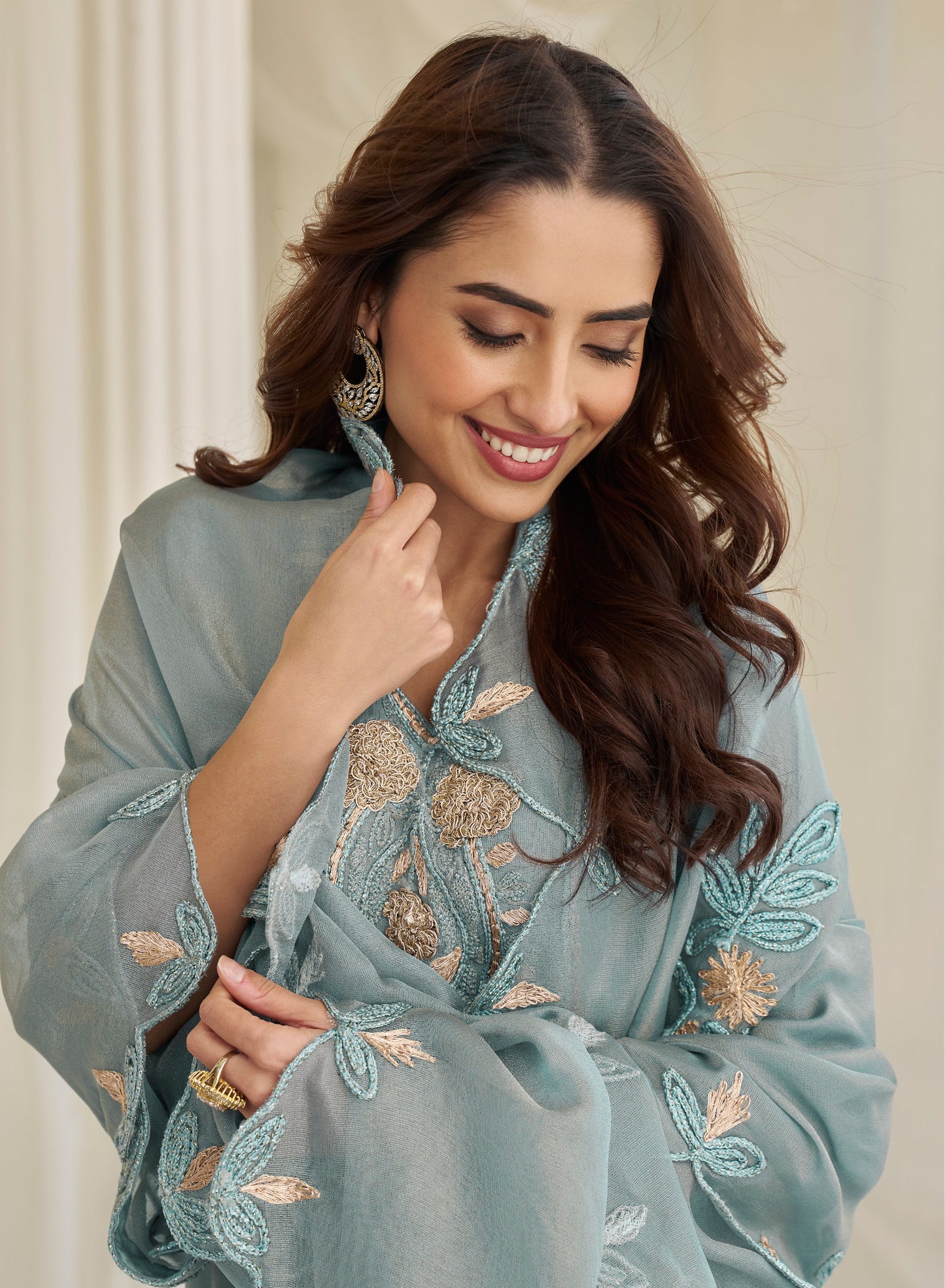 Hemline detail of blue salwar suit with embroidery