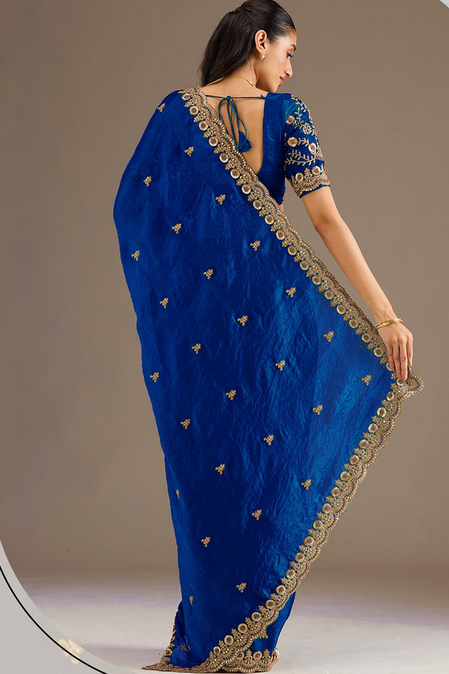 Dresses In Saree styling with blue sillk drape