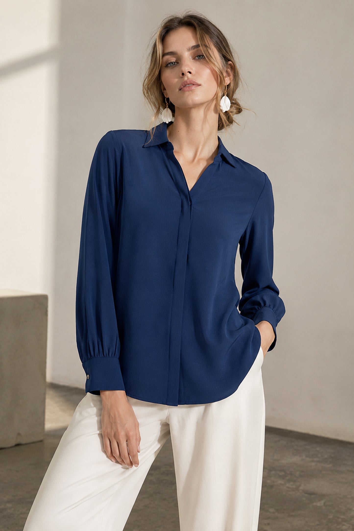 Close-up front view of the Blue solid Polyester shirt
