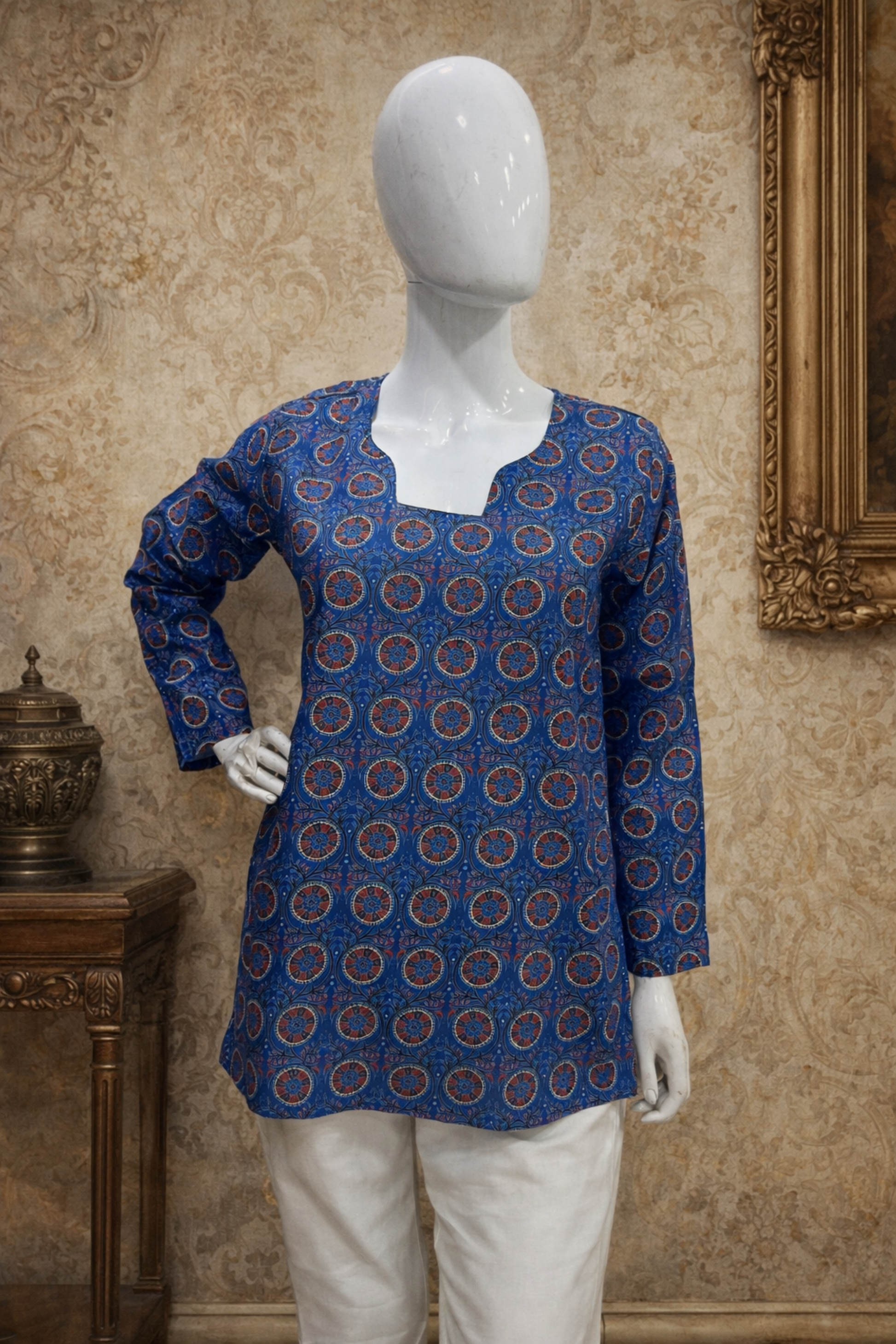 Blue top styled for office casual outfit look