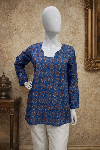 Blue top styled for office casual outfit look