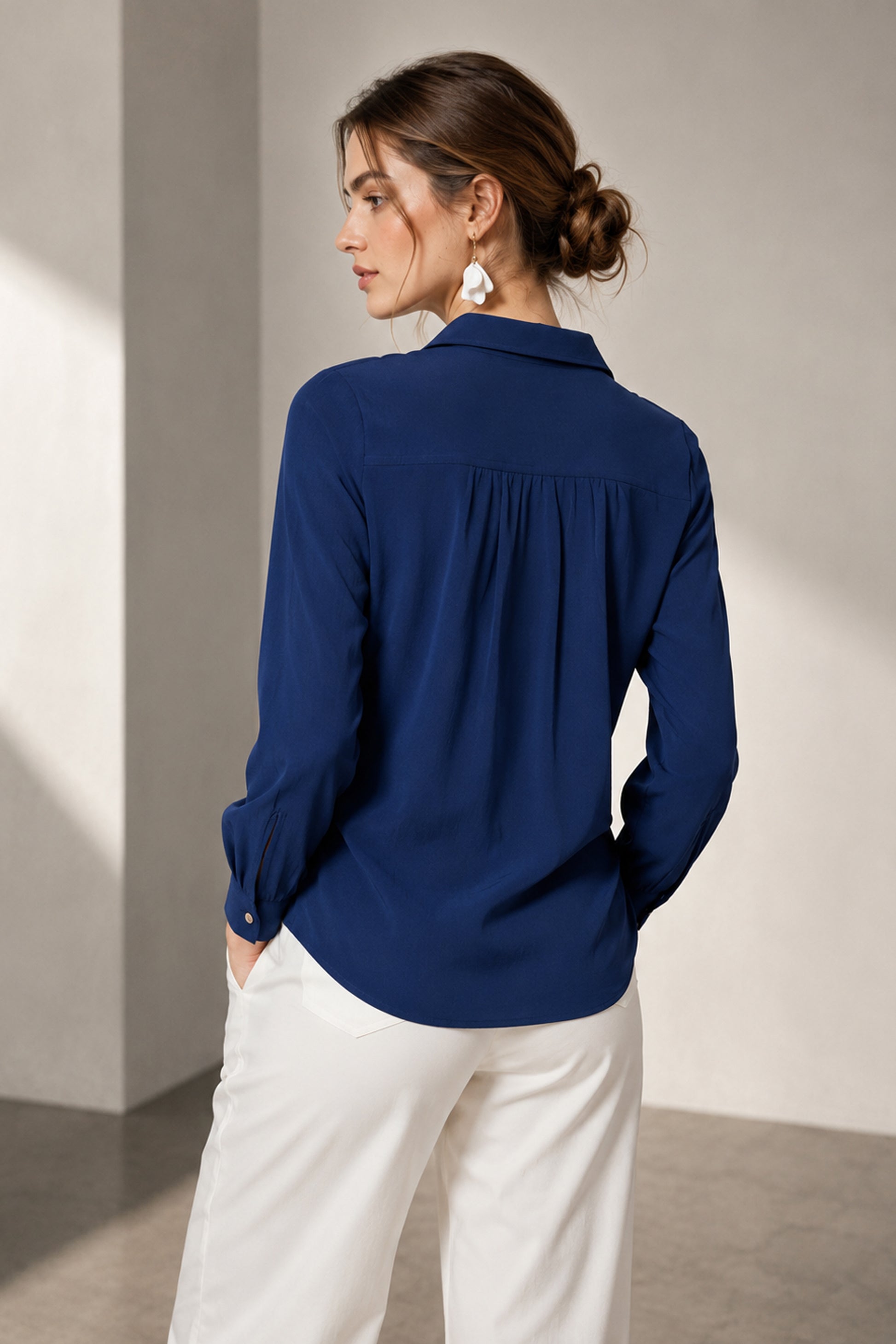 Rear view of Seyuri women's shirts in Blue solid Polyester