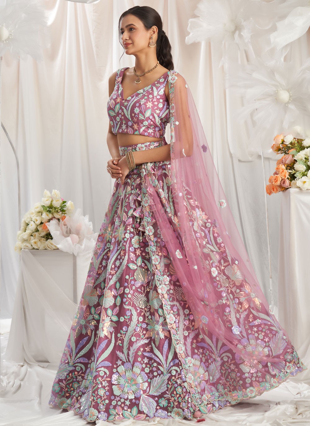 – lehenga in pink color side angle with dupatta drape
