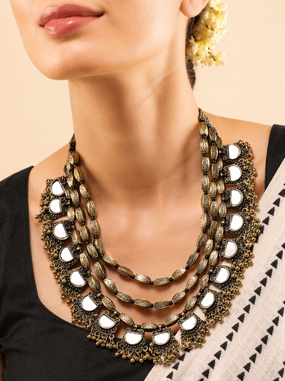 detailed craftsmanship of layered jewelry
