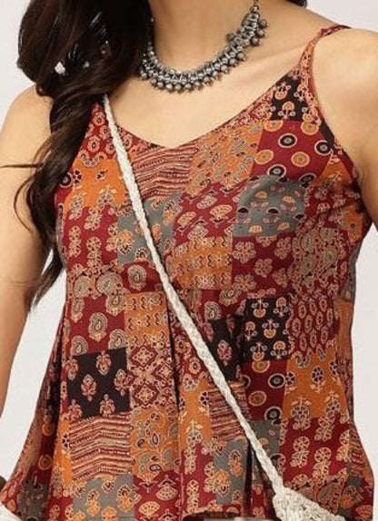 close up of floral embroidery on cotton women top