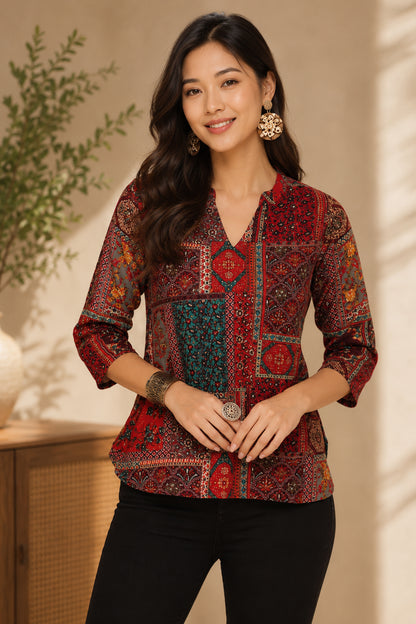 Woman wearing maroon ethnic motif tunic with woven tote bag