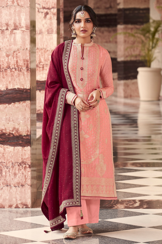 Bollywood style salwar kameez in peach shown from front view