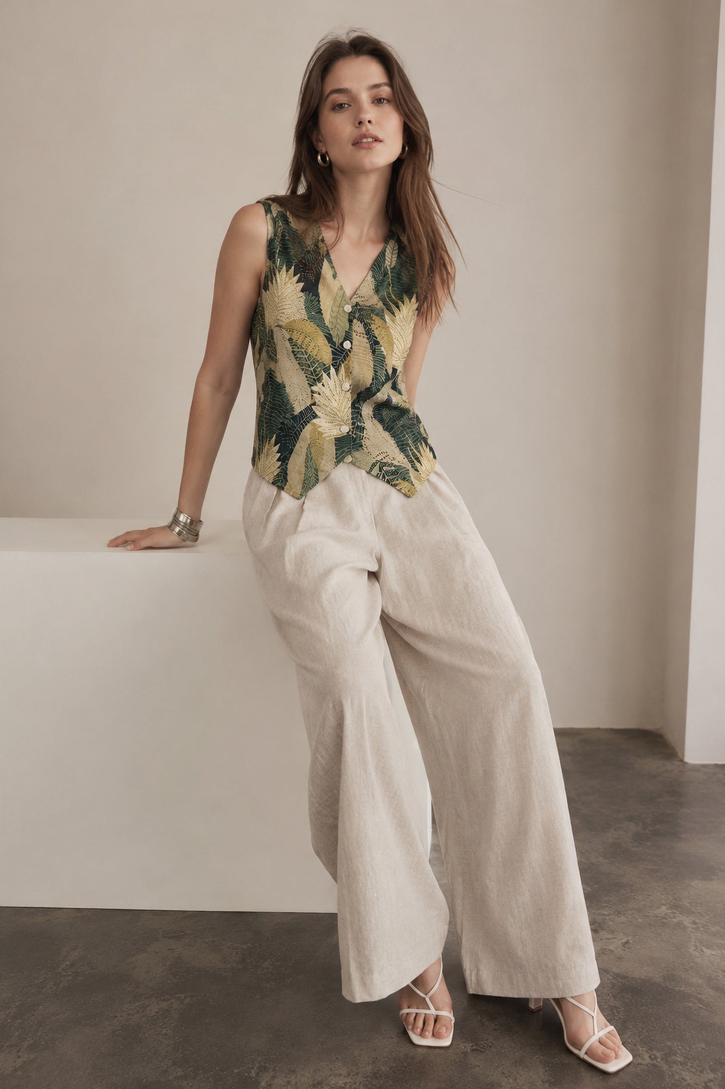 Front view of sleeveless vest top women with button closure detail