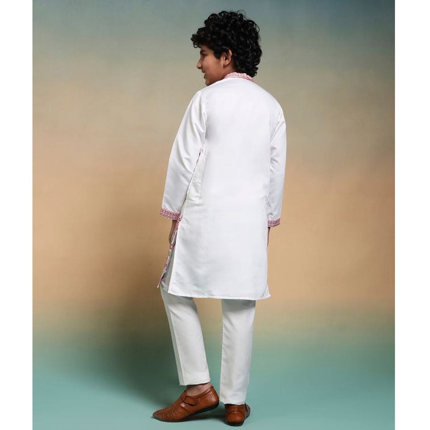 back view of boys kurta white design