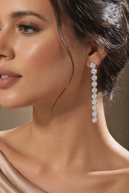 round cut diamond linear earrings close up