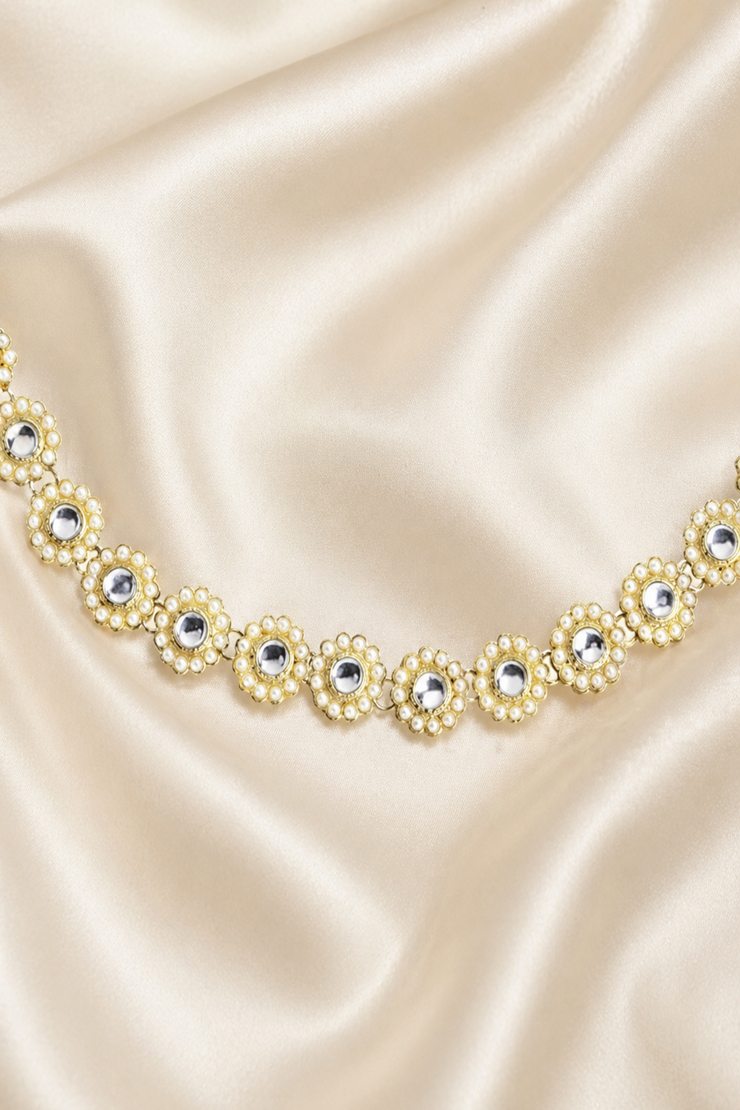 close-up of pearl detail hand harness bracelet design