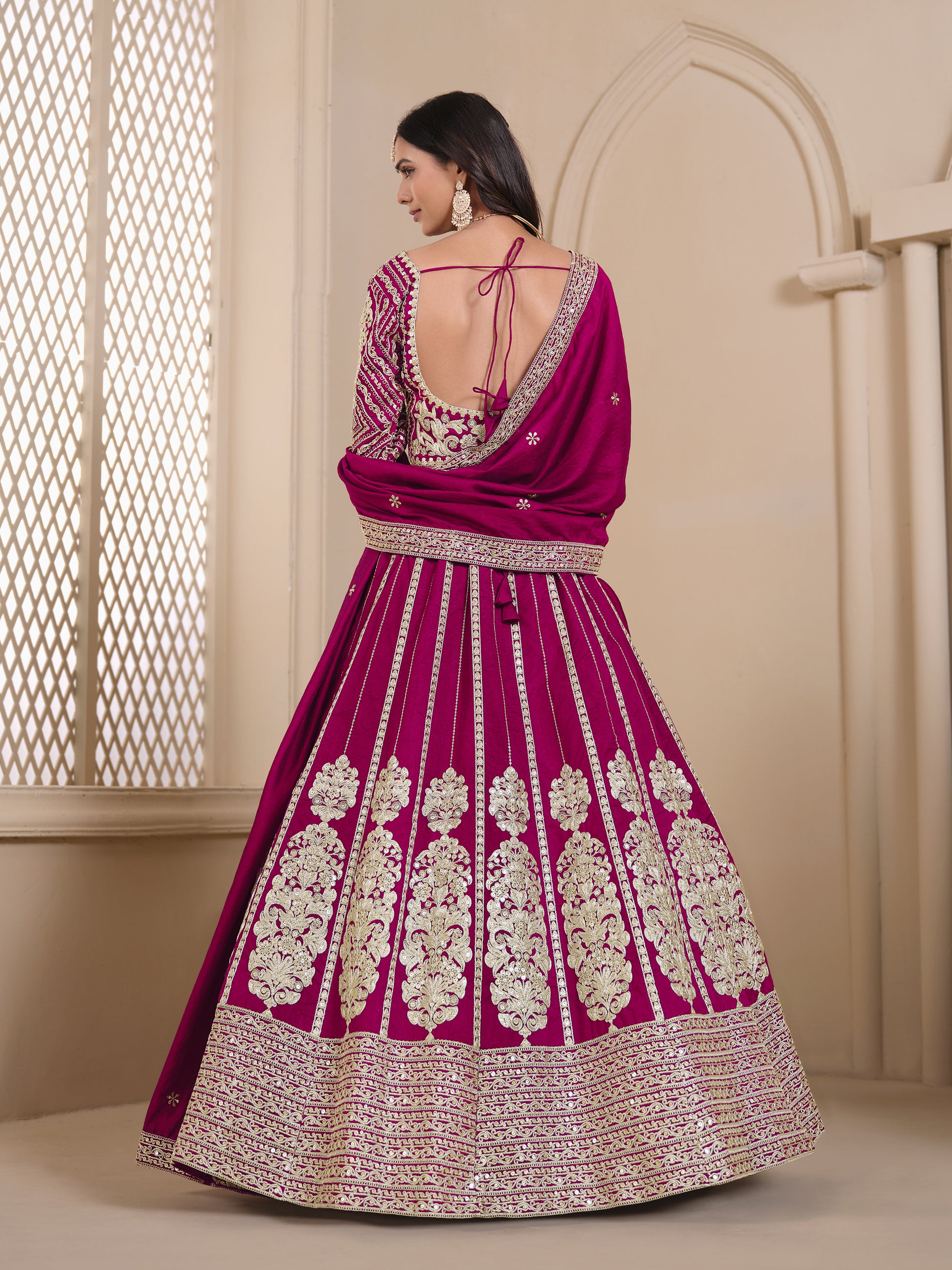 Elegant pink lehenga back view styling