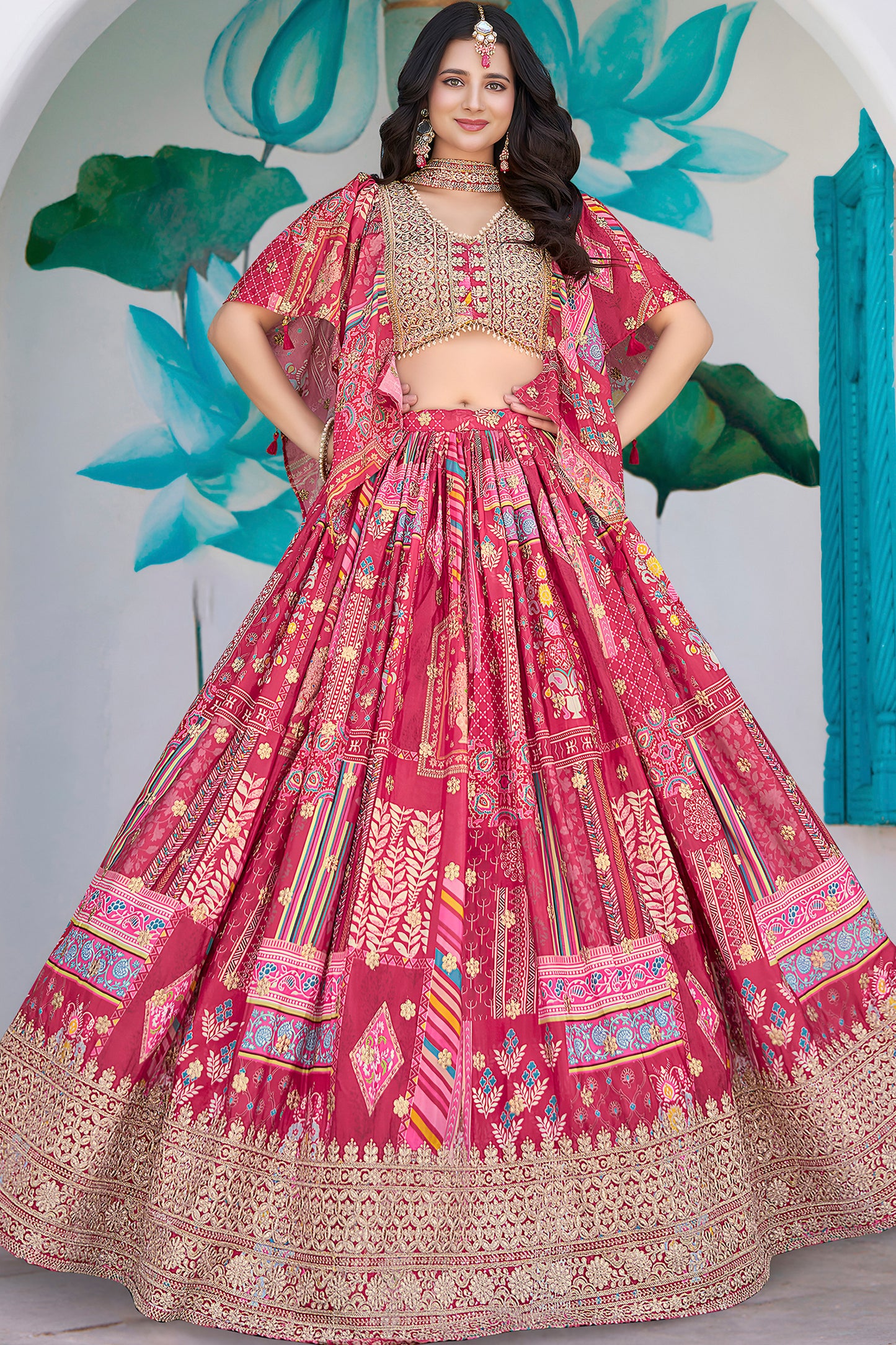 Bright pink embroidered lehenga choli full outfit view