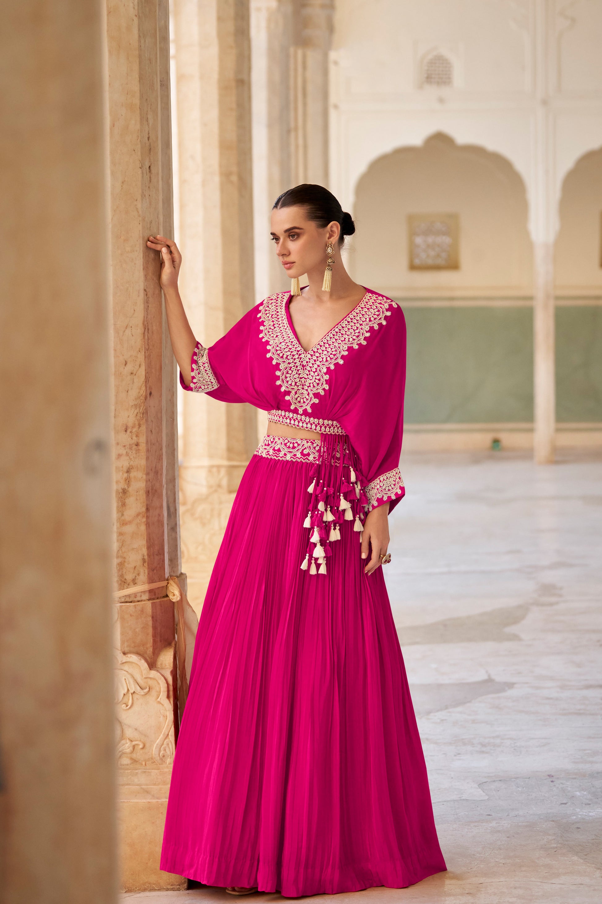 Pink lehenga front view with foil print detailing
