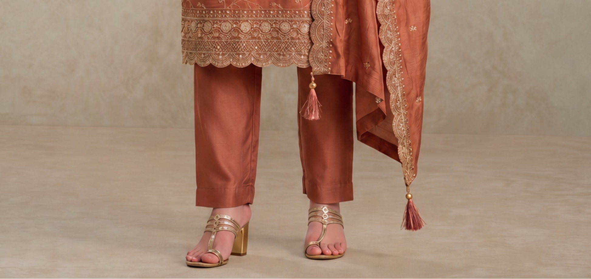 Bronze ethnic outfit for anniversary gatherings