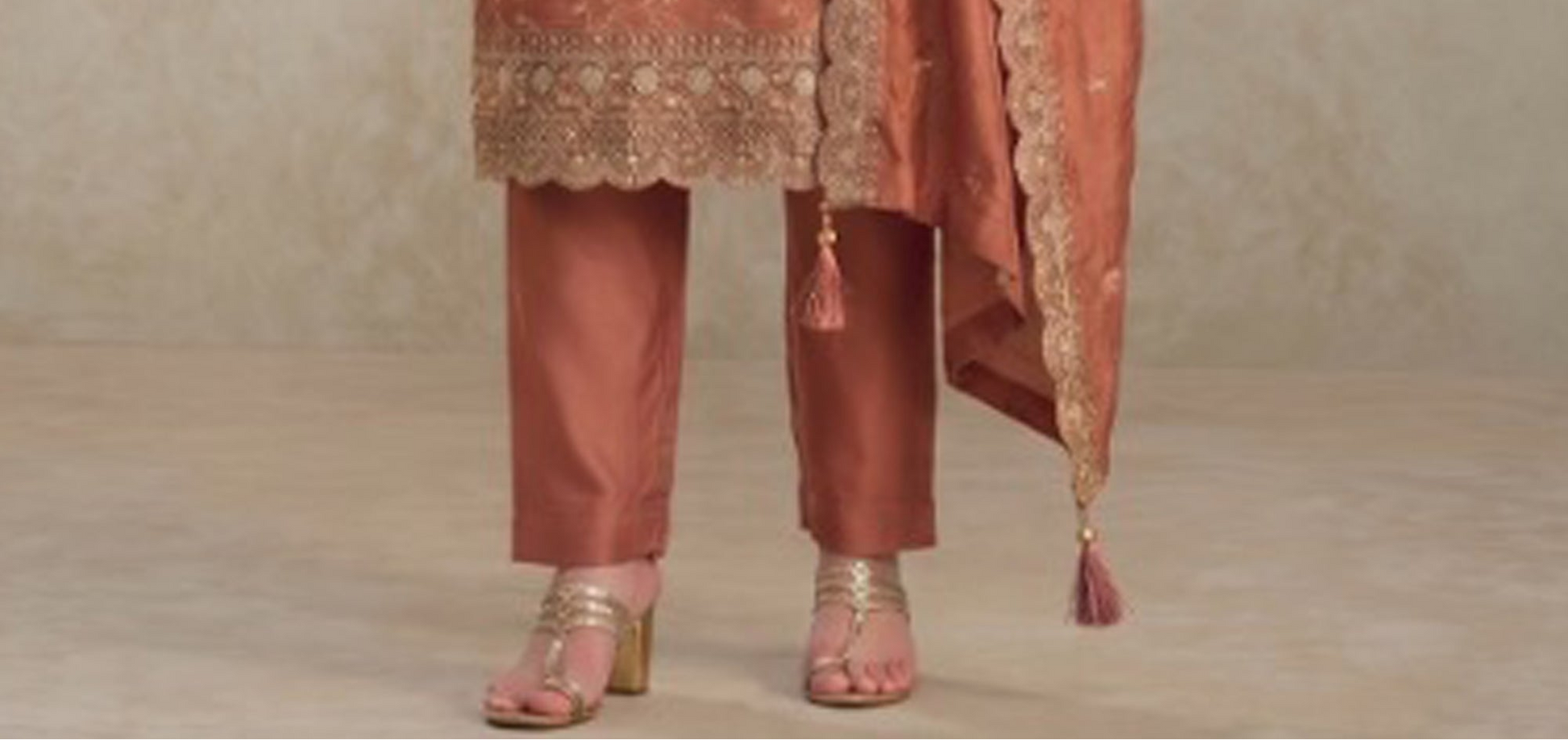 Bronze ethnic outfit for anniversary gatherings
