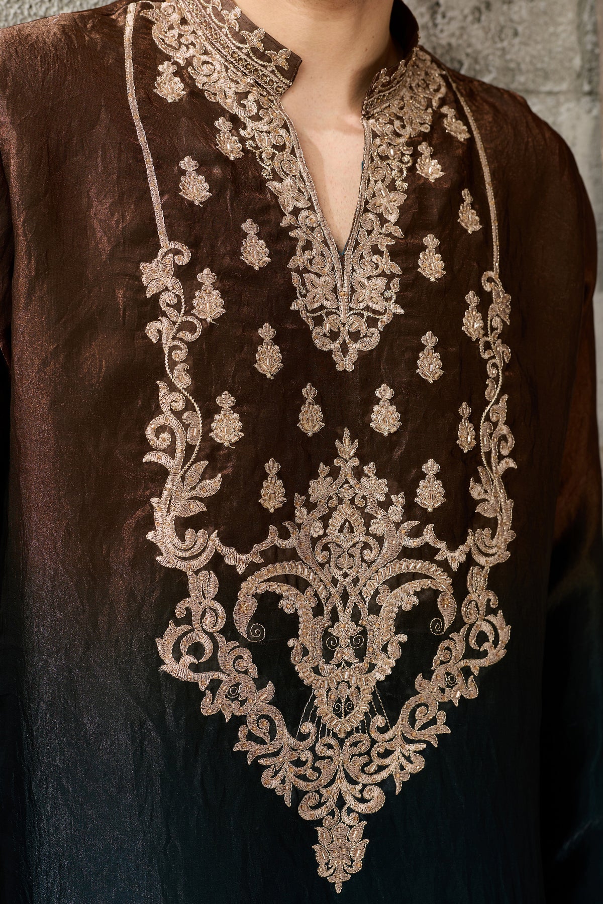 Sequin embroidery detail on a brown men's kurta