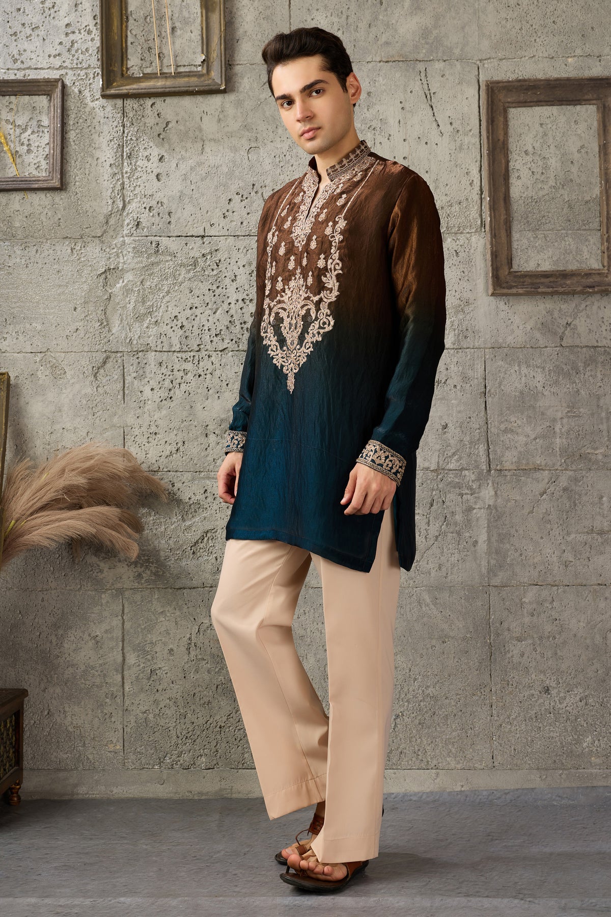 Hem detail of the brown kurta with embroidery