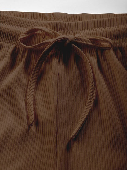 brown track pant waistband detail close-up