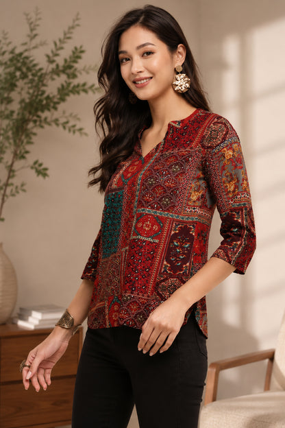 Side angle of maroon casual tunic with woven handbag