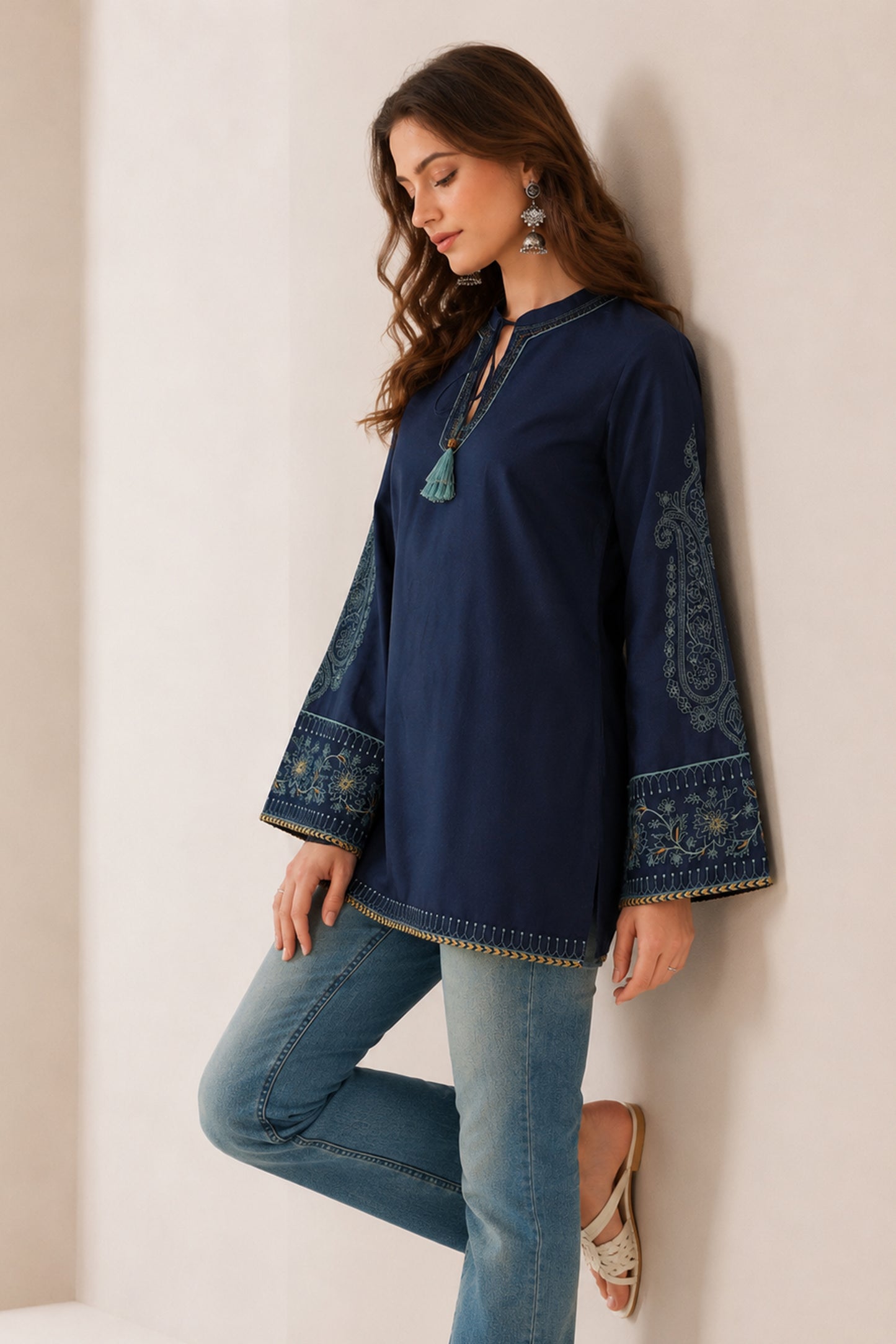 Casual embroidered tunic styled with light denim