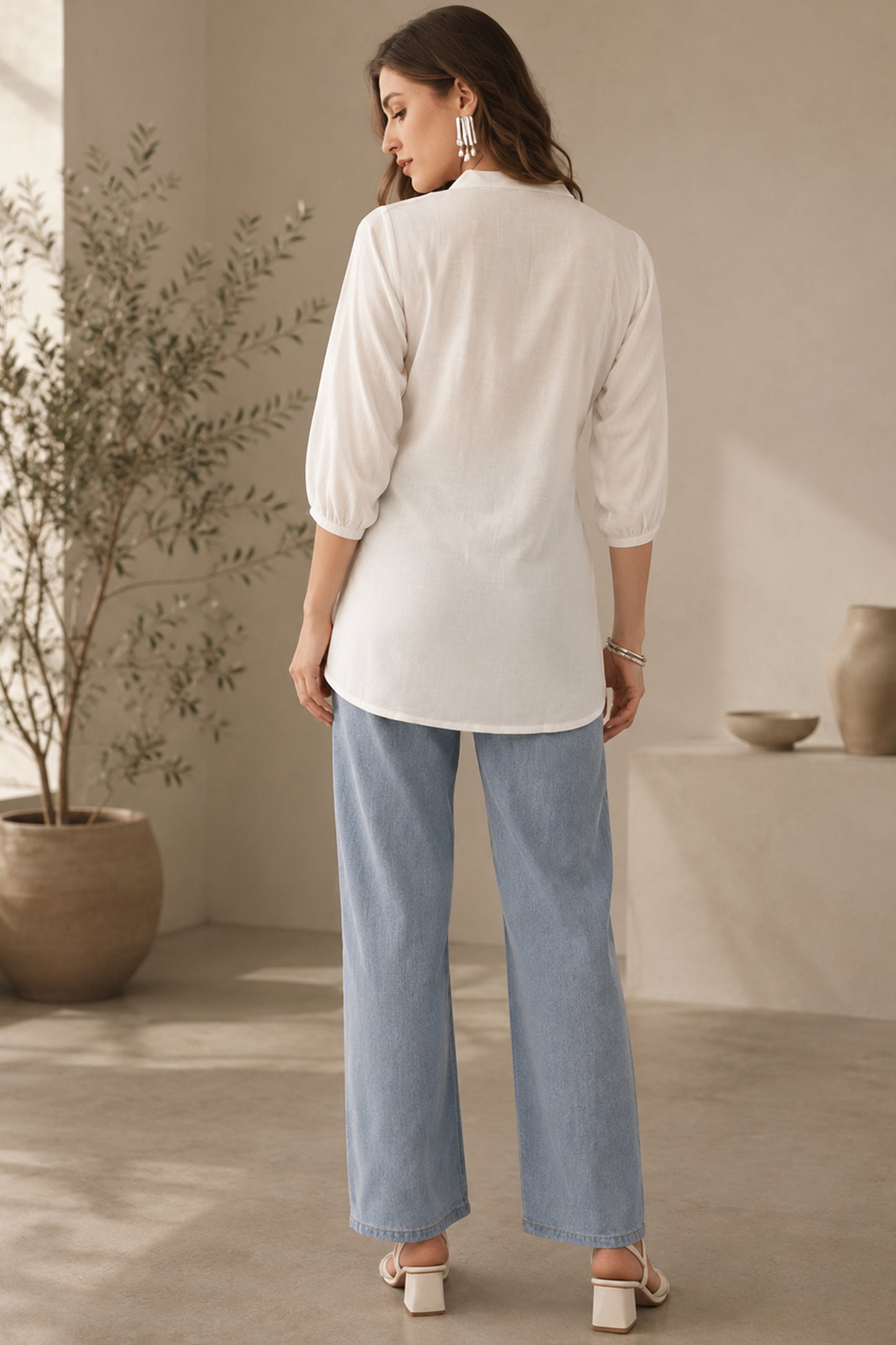 Womens tunic tops with floral embroidery and button neckline