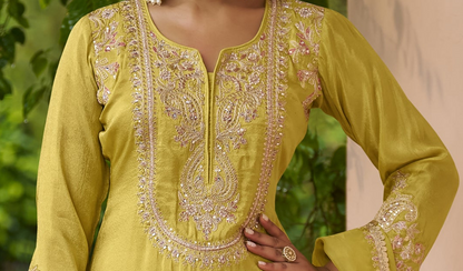 Indian sharara suits close-up showing embroidered top detail