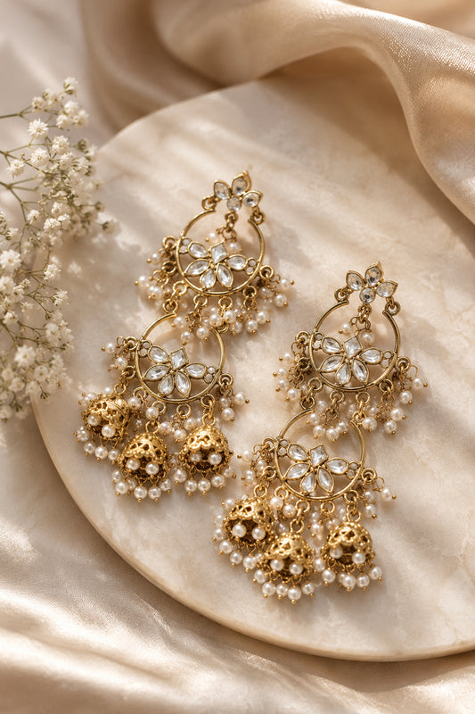 Gold tone Chandbali earrings with pearl drop detailing