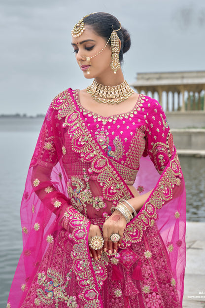 Close-up of sequins and embroidery work on pink lehenga