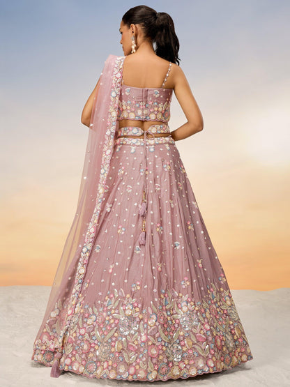 Back view of pink lehenga choli with embroidery