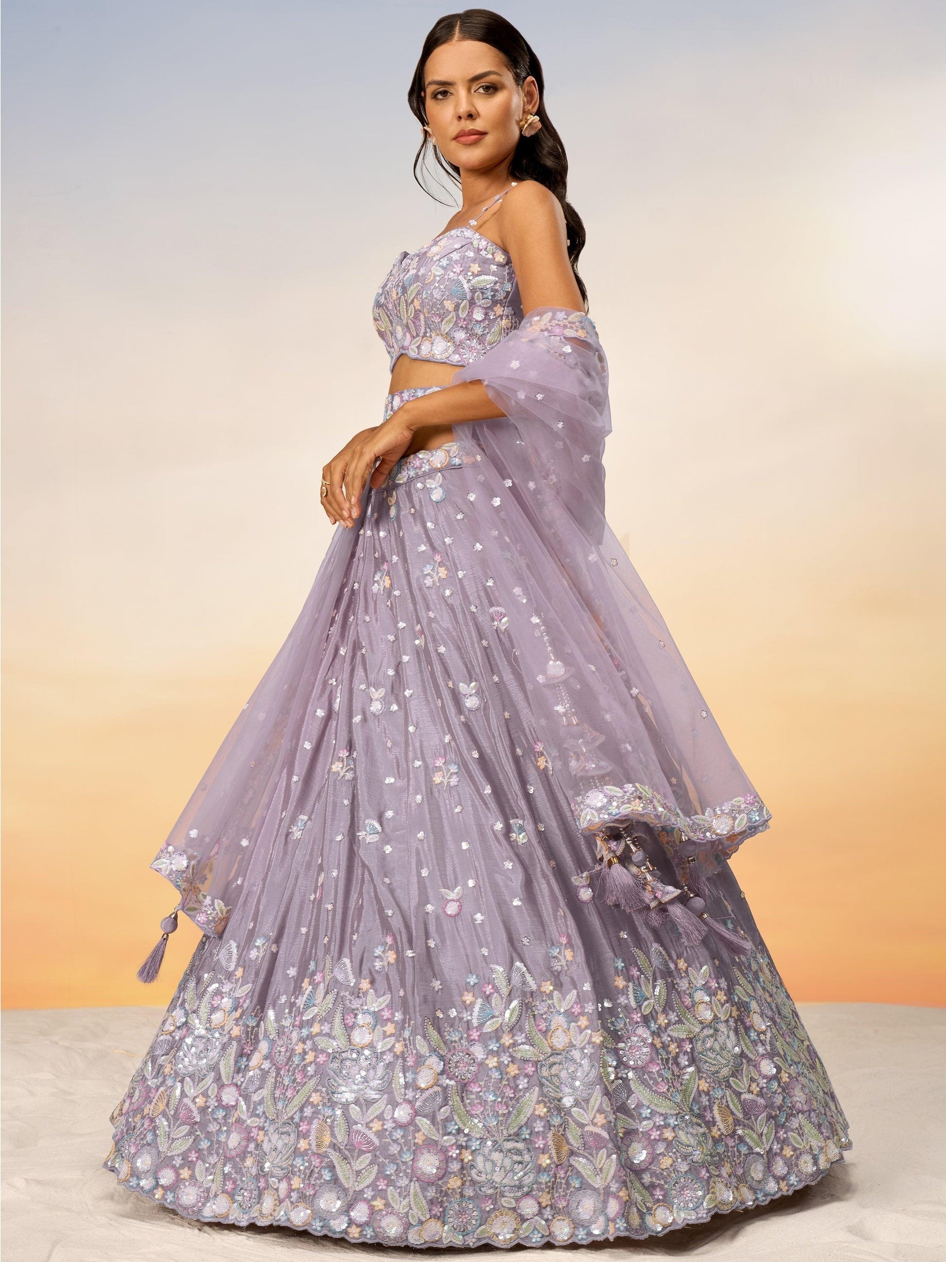 sequins work on light pink lehenga fabric detail