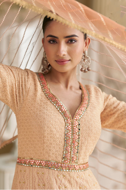 Close up of chikankari embroidery on peach anarkali