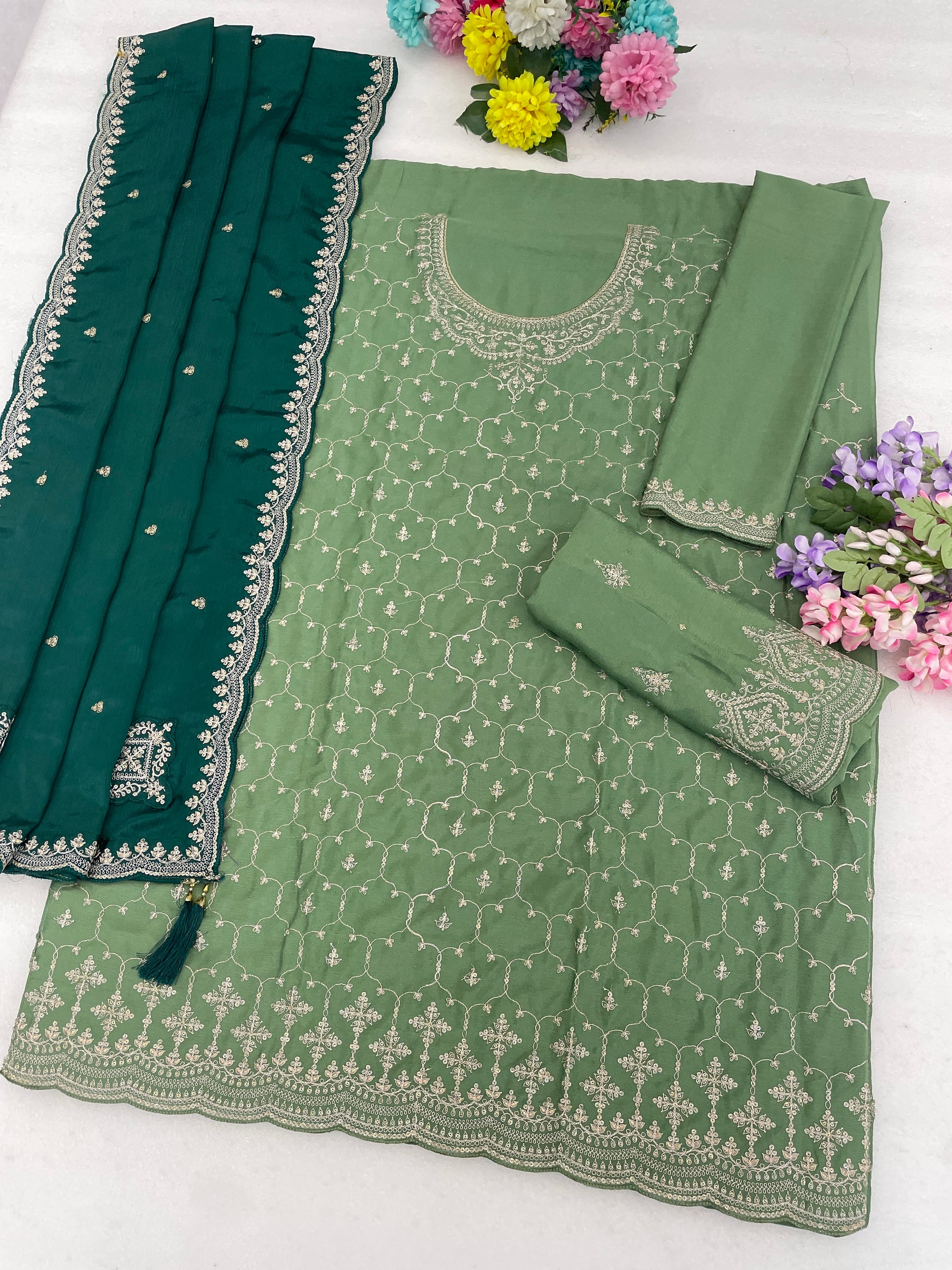 Fabric texture close-up of Chinon embroidered ethnic suit set
