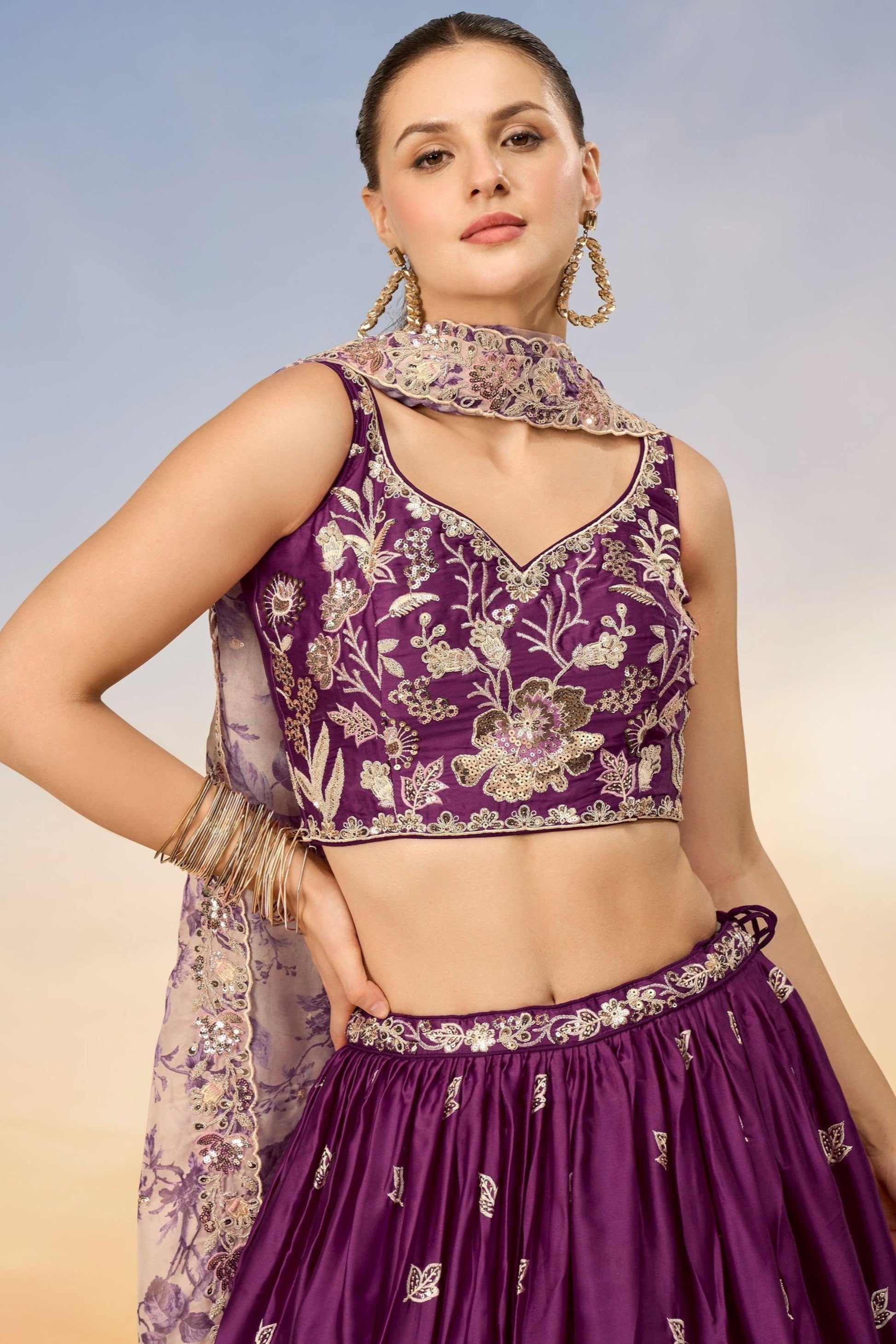 Close-up of thread embroidery and sequins work on chiffon lehenga