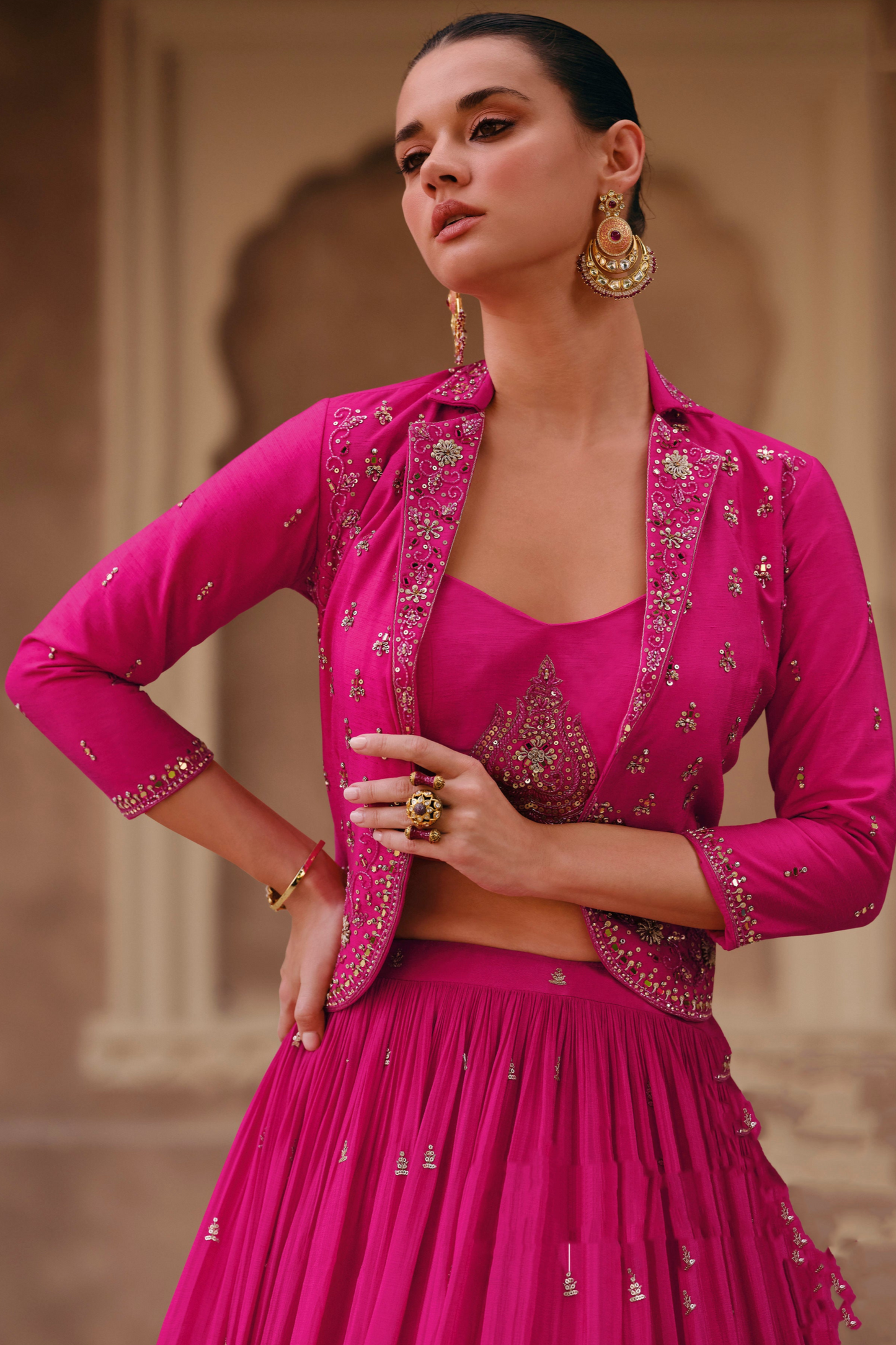 close up of zari embroidery on pink bridal lehenga design