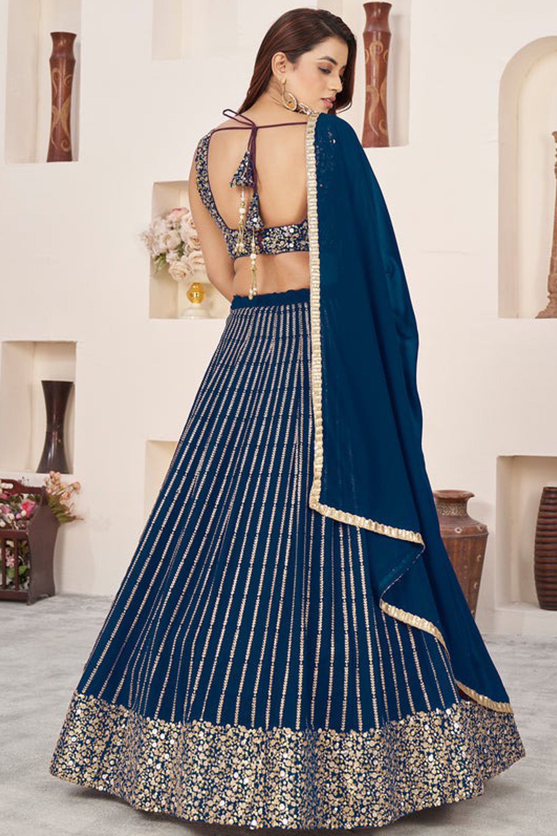 Navy blue choly back design with zari embellishment