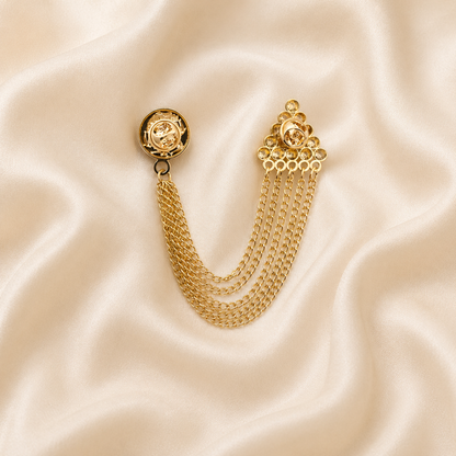 polished metal brooch with multi chain drop design