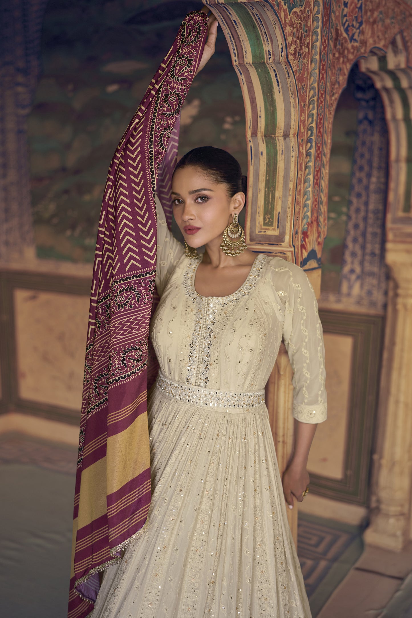 Close up of heavy embroidery on cream anarkali