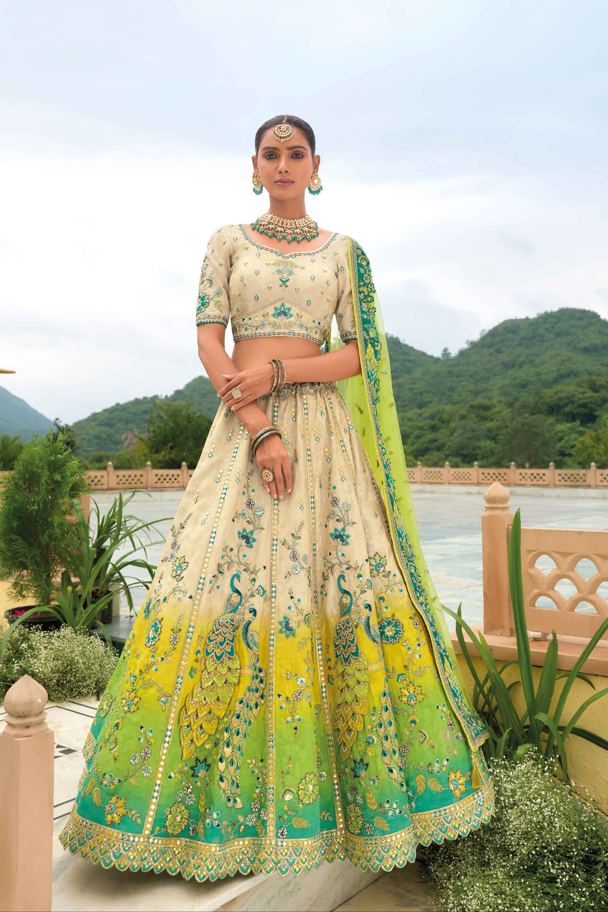 Cream lehenga front view with multi color shading
