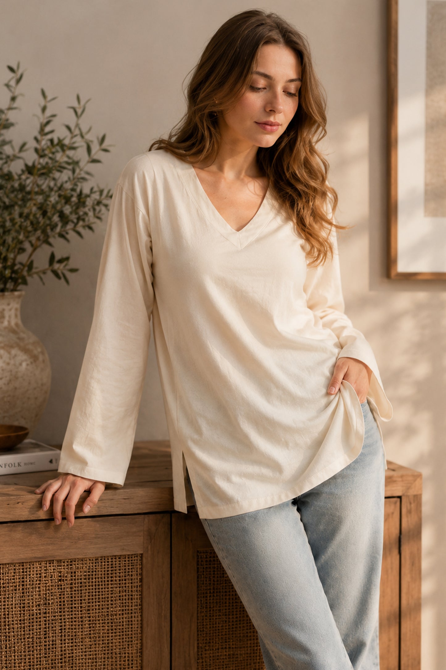 Front view of cream solid tunic for weekdays