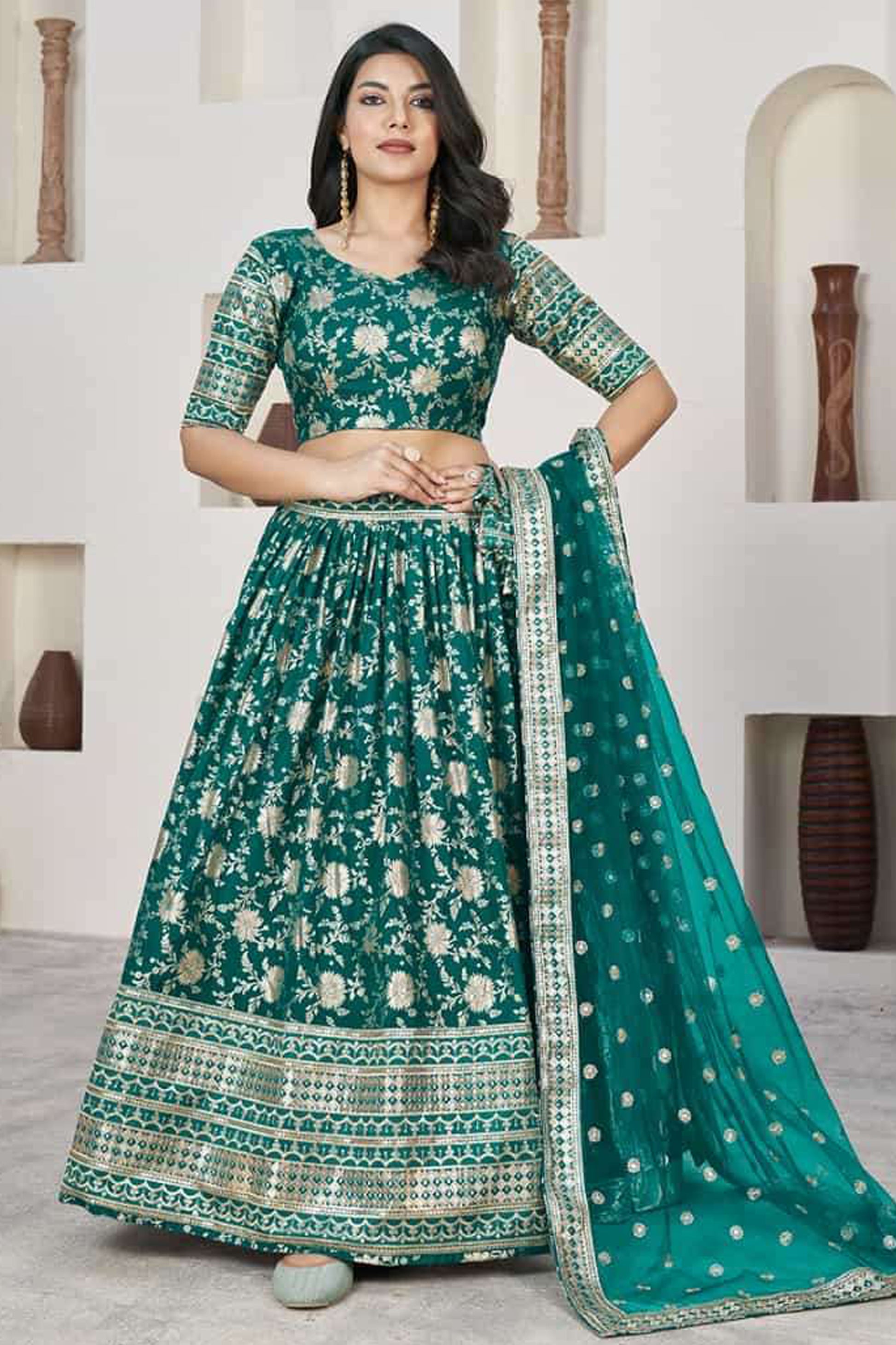 teal net lehenga choli with sequins zari embroidery detail